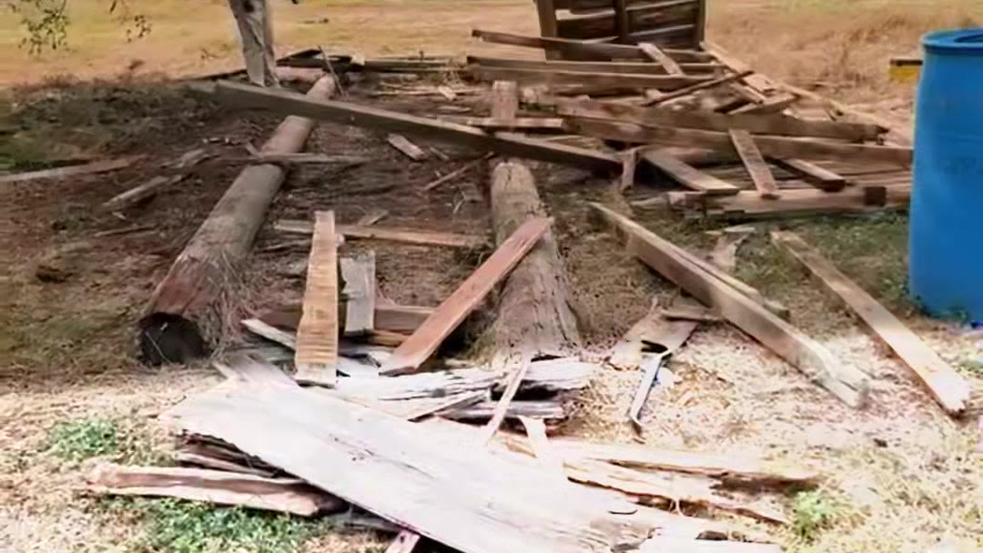 Weathered boards salvaged by hand from the old Giddens barn