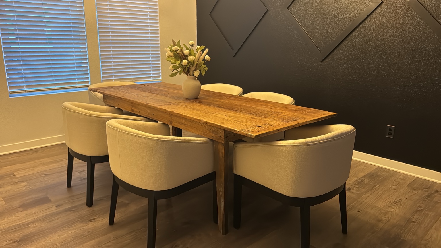 Martindale reclaimed-wood dining table against a dramatic black wall